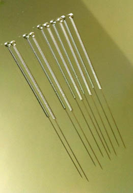 Stainless steel wound filiform acupuncture needles. 