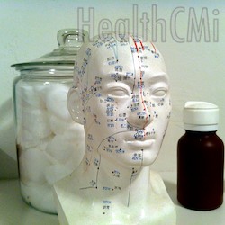 Model of scalp acupoints is depicted. 