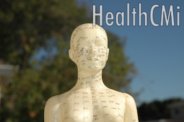 Acupoints shown on a doll. 